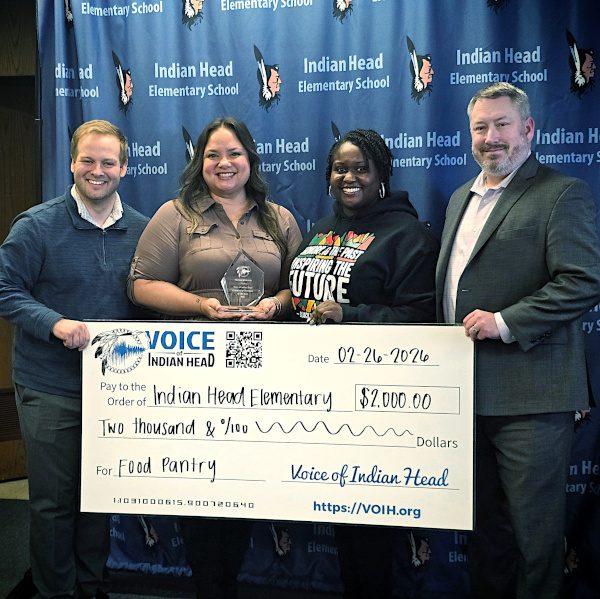 Mayor Brandon Paulin and Victor Foulk present the award to Marissa Ackerman with Assistant Principal Janee Johnson